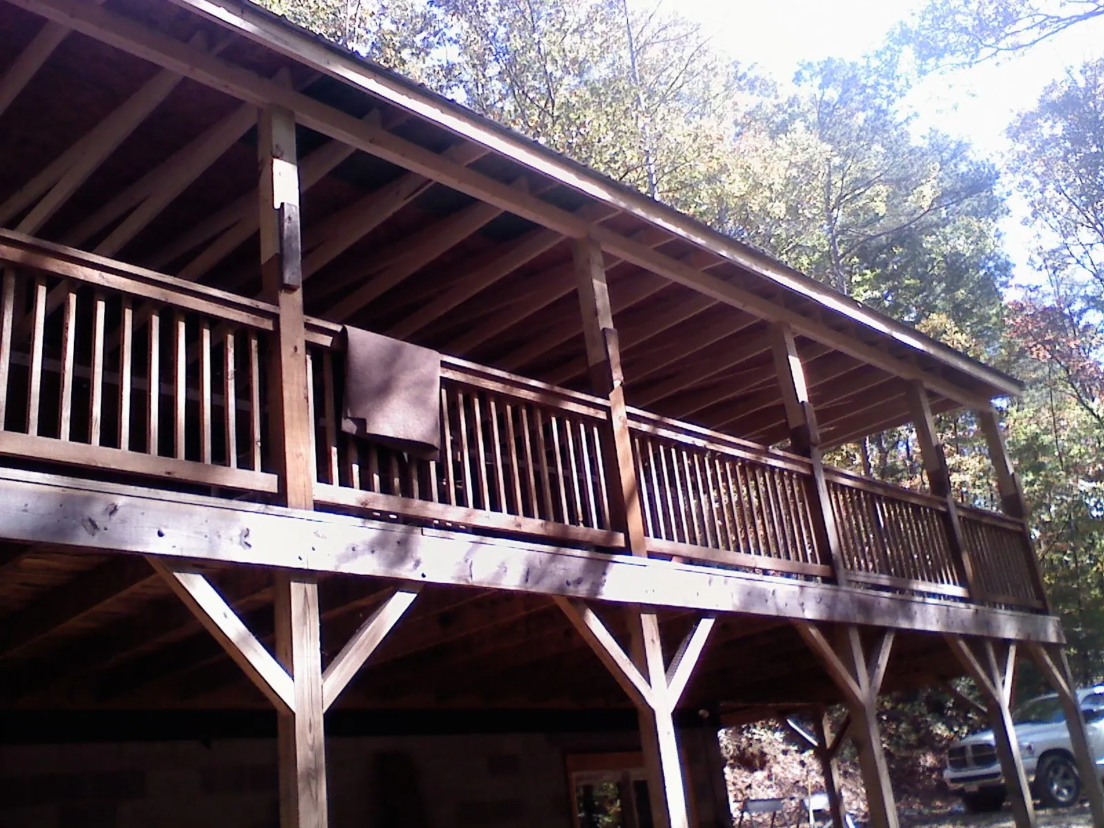 Timber framing under a new elevated porch and deck — Roof Leak Repair in Russells Point by Roofing Brothers